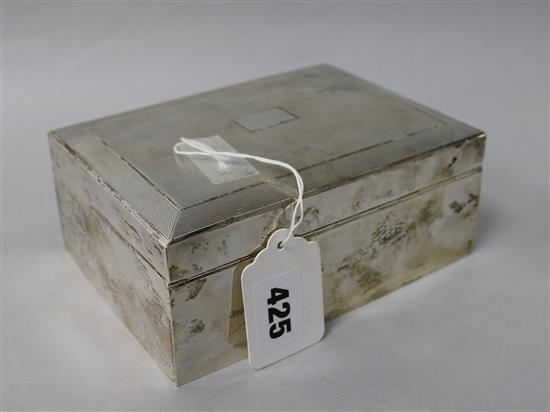 A 1960s engine turned silver cigarette box, 6.25in.